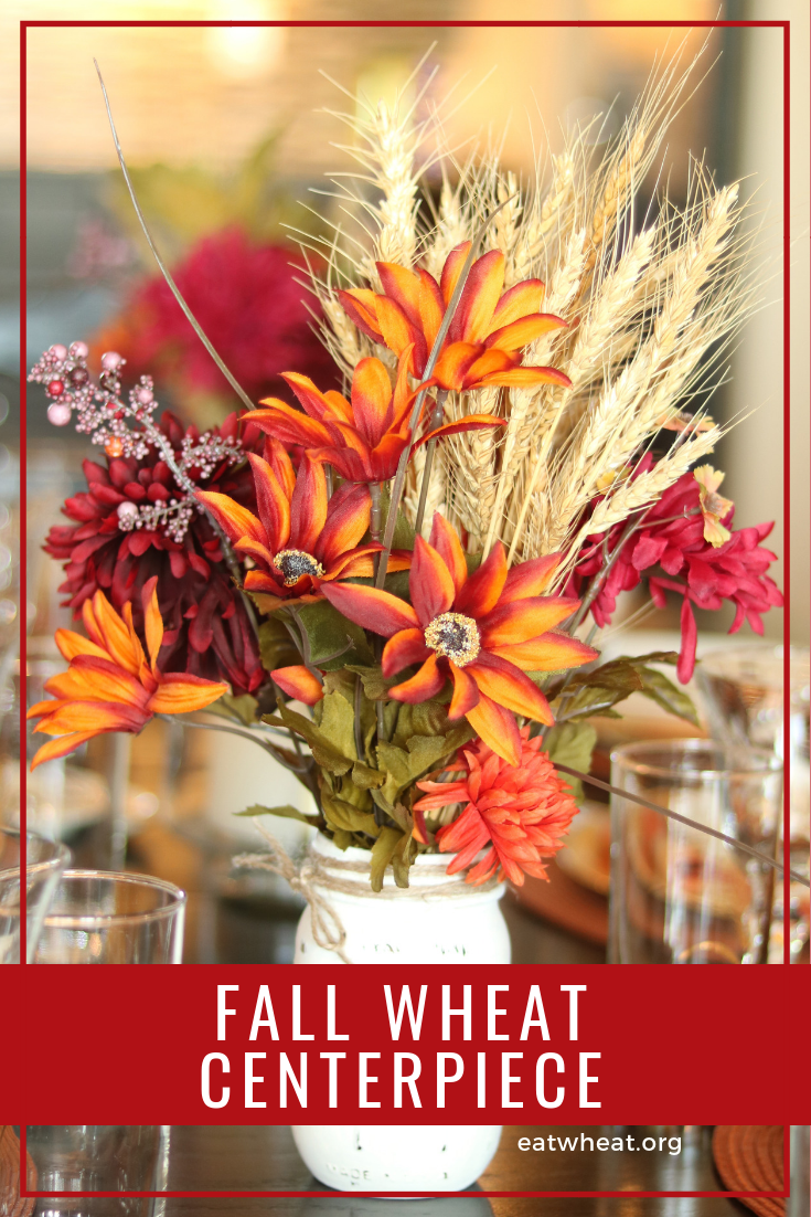 Decorate your Thanksgiving table with this fall centerpiece, which uses silk flowers and wheat | eatwheat.org