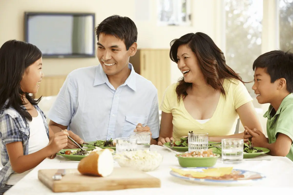 Family eating meal together. Eat Better. Eat Together.