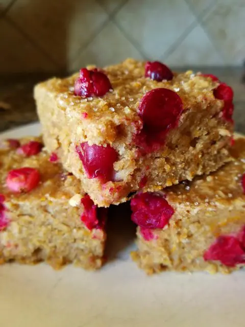 Want a whole grain snack? Wake up your taste buds with these Cranberry Orange Breakfast bars. The cranberries, packed with antioxidants, are bursting with flavor and tartness. These whole grain breakfast bars are heart healthy and are perfect for a breakfast on-the-go or enjoyed at home! Whip up a batch of these bars and store in the refrigerator or individually wrap each bar and freeze to enjoy at a later date.