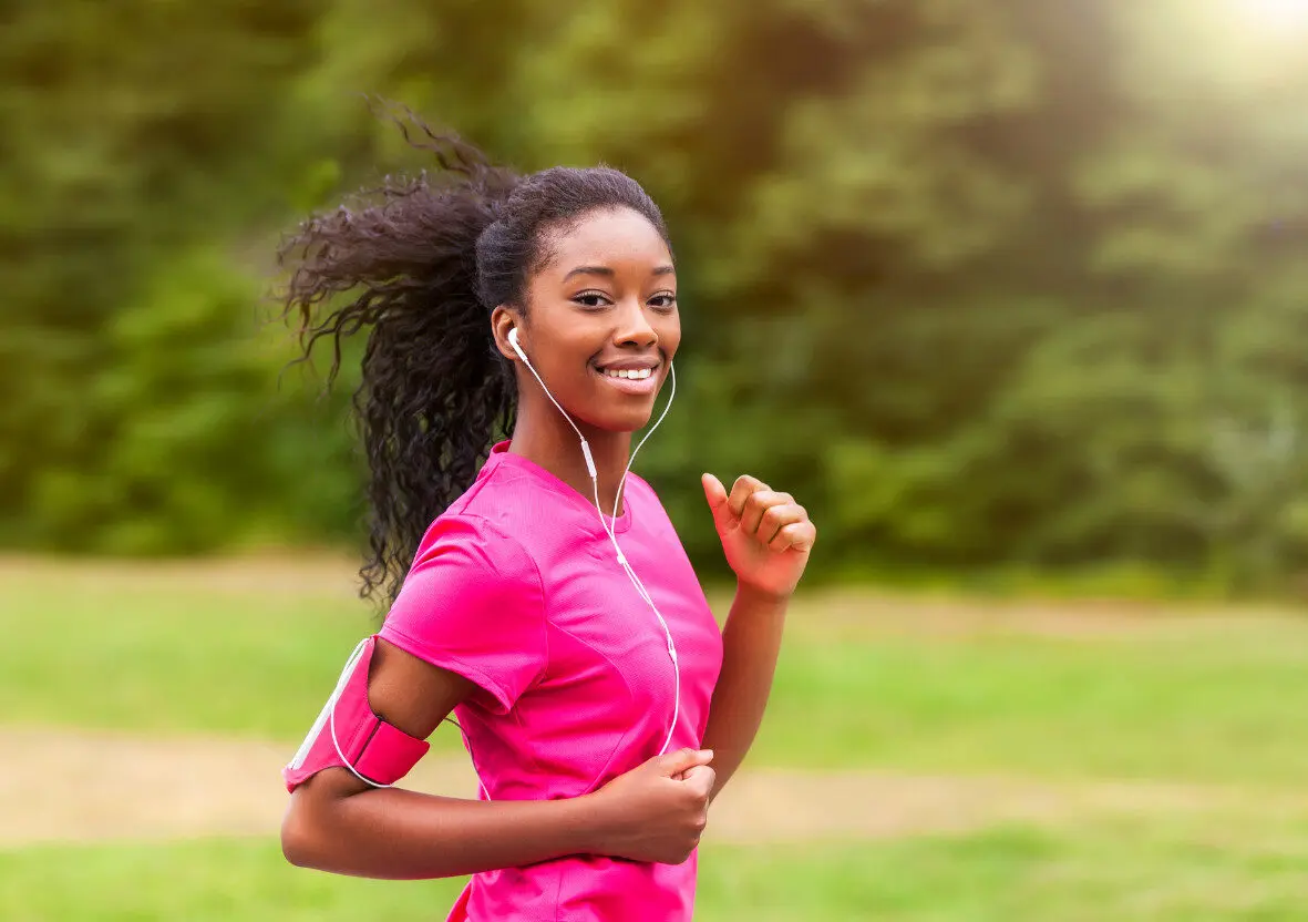 Photo: Woman running with thiamine for energy.