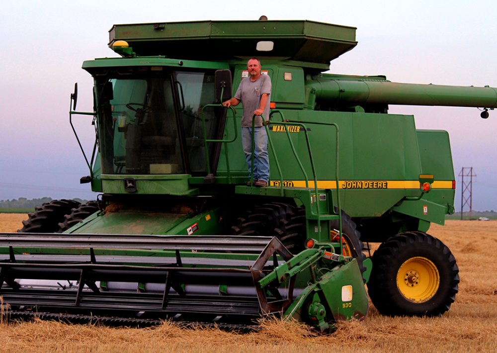 A Kansas combine taking a break during wheat harvest. There are many farm machines used to grow your food