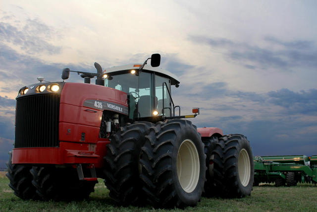 Farmers use tractors, like this Versatile 435, to pull drills and other farm implements.