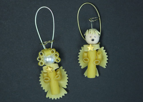 DIY Pasta angels created with wheat pasta, pearls and wire halos ready to hang on the tree