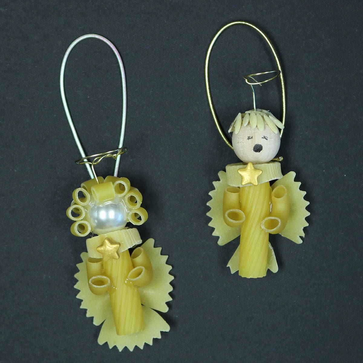 DIY Pasta angels made with wheat pasta, pearls and wire halos ready to hang on a tree.