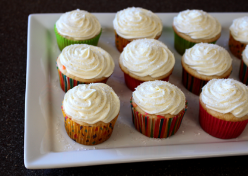 Perfect cupcakes for parties, Celebration Cupcakes in colorful wrappers on white plate