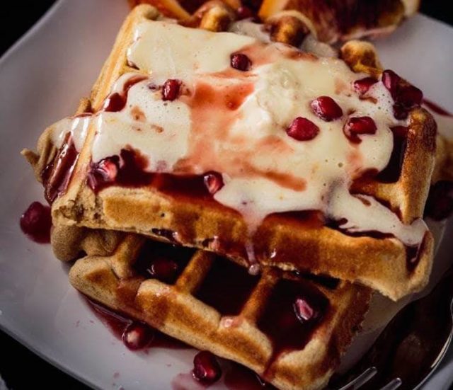 Waffles with pomegranate and blood orange syrup and mascarpone cream. This is one of our unique waffle recipes