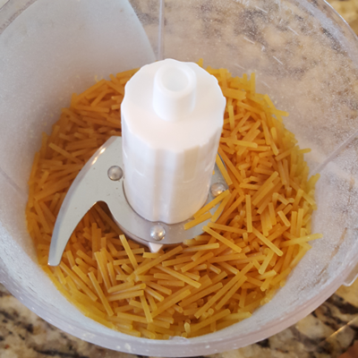 Image: break uncooked spaghetti noodles into small pieces.
