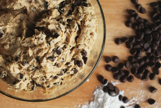 Raw dough in a bowl with chocolate chips and flour