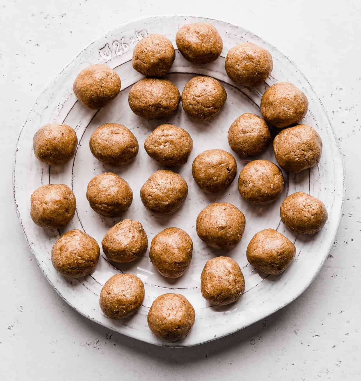 Snicker Doodle Protein Balls on a white Plate make for an easy lunch box recipes