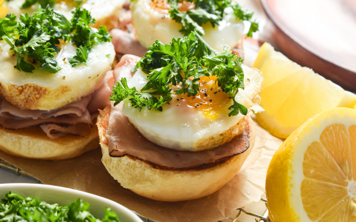 Image: Open-Faced Poached Eggs and Prosciutto Breakfast Sandwiches.