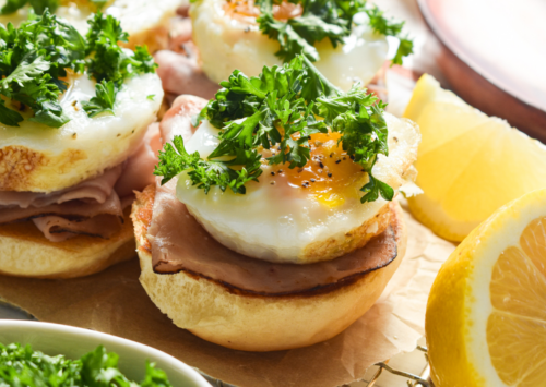Image: Open-Faced Poached Eggs and Prosciutto Breakfast Sandwiches.